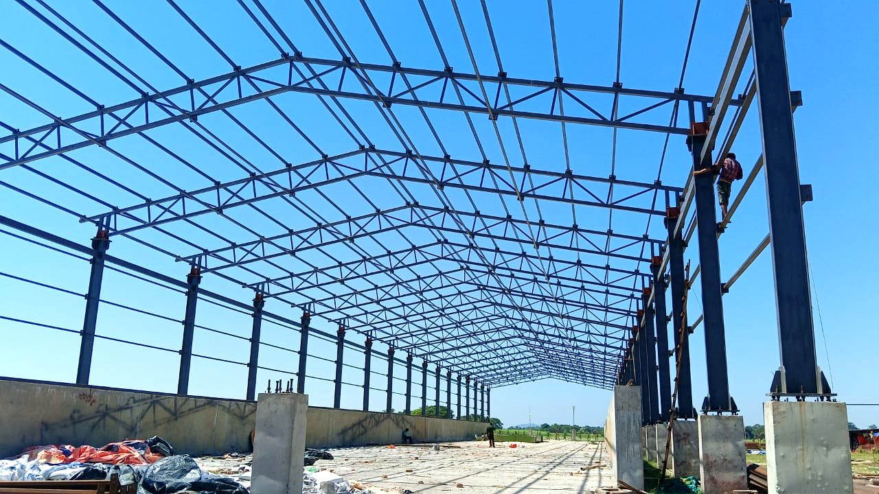 Steel roof truss structure fabricated and erected by FabSteel on a warehouse site